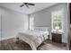 Main bedroom featuring wood floors, neutral walls, and natural light at 105 Bobcat Ln, Ravenel, SC 29470
