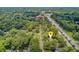 The neighborhood is surrounded by green trees and landscaping from this high aerial perspective at 109 Fort St, Summerville, SC 29485
