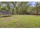 Grassy backyard perfect for outdoor recreation with mature trees and recreational equipment at 109 Fort St, Summerville, SC 29485
