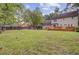 Spacious backyard featuring a wooden deck and lush lawn, great for outdoor activities at 109 Fort St, Summerville, SC 29485
