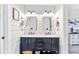 Charming bathroom with a double vanity, marble countertop, and modern fixtures, offering a blend of style and functionality at 109 Fort St, Summerville, SC 29485