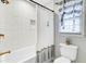 Cozy bathroom with tub and shower, decorative curtain, and natural light, providing a comfortable and functional space at 109 Fort St, Summerville, SC 29485