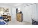 Bright bedroom with closet, wood dresser, and decor creates a cozy, organized space at 109 Fort St, Summerville, SC 29485
