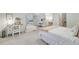 Bright bedroom featuring queen sized bed, desk, and daybed creates a comfortable retreat at 109 Fort St, Summerville, SC 29485