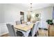 Elegant dining room featuring a rustic table, chandelier, and stylish decor at 109 Fort St, Summerville, SC 29485