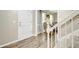 Inviting foyer with stylish flooring, a staircase, and a view into the adjacent living area at 109 Fort St, Summerville, SC 29485