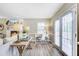 Cozy living room with fireplace, desk, and doors that lead to a large backyard space at 109 Fort St, Summerville, SC 29485