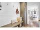 Inviting mudroom with bench seating, storage, and stylish decor, leading to the dining area, perfect for organization at 109 Fort St, Summerville, SC 29485
