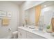 Bright bathroom with double sinks, a large mirror, and elegant decor at 109 Indigo Cove Blvd, Summerville, SC 29486