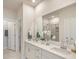 Elegant bathroom with double sinks, a large mirror, and a glass-enclosed shower at 109 Indigo Cove Blvd, Summerville, SC 29486