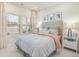 Bright bedroom featuring stylish decor, three modern art pieces, and soft, inviting bedding at 109 Indigo Cove Blvd, Summerville, SC 29486