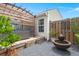 Secluded backyard deck with a pergola-covered seating area and decorative fountain, perfect for relaxing at 1103 Cates Ct, Summerville, SC 29483
