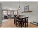 Dining area boasts a wooden table set, stylish lighting, and decor with a convenient nearby office space at 1103 Cates Ct, Summerville, SC 29483