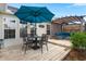 Charming patio featuring a dining area with an umbrella, plus a shaded outdoor seating area at 1103 Cates Ct, Summerville, SC 29483