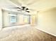 Bedroom with neutral carpeting, and two sunny windows at 112 Lake Jogassee Dr, Summerville, SC 29485