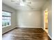 Neutral bedroom with hardwood floors, a ceiling fan, and natural light at 112 Lake Jogassee Dr, Summerville, SC 29485