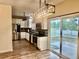 The kitchen features stainless steel appliances, modern cabinets, and hardwood floors at 112 Lake Jogassee Dr, Summerville, SC 29485