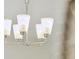 A modern chandelier with five lights hangs from the ceiling at 112 Moscato Ln, Summerville, SC 29485