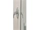 A close-up shot of a chrome shower knob on a shower wall with a glass door and chrome hardware at 112 Moscato Ln, Summerville, SC 29485