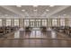 Expansive ballroom perfect for events, featuring hardwood floors and elegant chandeliers at 117 Harbor Trace Ln, Summerville, SC 29486