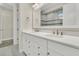 Well-lit bathroom featuring a double vanity with modern fixtures and a walk-in shower at 117 Harbor Trace Ln, Summerville, SC 29486