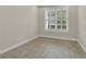 Bright, airy bedroom featuring wood-look floors and shuttered window at 117 Harbor Trace Ln, Summerville, SC 29486
