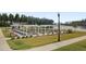 Bocce ball court surrounded by serene landscaping, adding a touch of recreation and leisure at 117 Harbor Trace Ln, Summerville, SC 29486