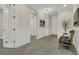 Welcoming foyer with wood-look tile floors, chair rail, and a view of the home's interior at 117 Harbor Trace Ln, Summerville, SC 29486