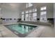 Relaxing indoor hot tub area featuring ample natural light and comfortable seating at 117 Harbor Trace Ln, Summerville, SC 29486