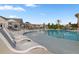 Community pool with plenty of seating and umbrellas, perfect for a relaxing afternoon at 117 Harbor Trace Ln, Summerville, SC 29486