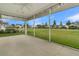 Inviting screened porch offering serene outdoor views and a comfortable space for relaxation at 117 Harbor Trace Ln, Summerville, SC 29486
