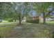 Charming single-Gathering home with mature trees, a well-maintained lawn, and traditional brick exterior at 117 Myer Ln, Goose Creek, SC 29445
