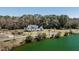 Stunning waterfront home with lush landscaping and inviting curb appeal at 1174 Hitchfield Ln, Awendaw, SC 29429