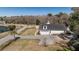 Aerial view of a home with an attached garage and long driveway at 1174 Hitchfield Ln, Awendaw, SC 29429