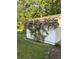 Charming shed covered in climbing roses, adding a touch of beauty at 1174 Hitchfield Ln, Awendaw, SC 29429