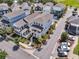 Aerial view of a coastal neighborhood featuring charming homes, palm trees, and well-maintained landscaping at 1182 Welcome Dr Dr, Mount Pleasant, SC 29464
