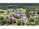 An aerial view of a residential community, showcasing the pool, golf course, and tennis courts at 1182 Welcome Dr Dr, Mount Pleasant, SC 29464