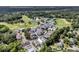 Aerial view of the community with the pool, clubhouse, tennis courts, and golf course at 1182 Welcome Dr Dr, Mount Pleasant, SC 29464