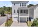 Three-story home with a screened-in porch and convenient two-car garage in a Gathering neighborhood at 1182 Welcome Dr Dr, Mount Pleasant, SC 29464