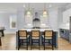 Open concept kitchen with large island, pendant lighting, stainless appliances, and white and navy cabinets at 1182 Welcome Dr Dr, Mount Pleasant, SC 29464