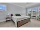 Bright main bedroom with carpet, side tables, reading lamps and comfy chairs at 1182 Welcome Dr Dr, Mount Pleasant, SC 29464