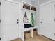 Convenient mudroom features a bench with storage and hooks, perfect for organizing coats and bags at 1182 Welcome Dr Dr, Mount Pleasant, SC 29464