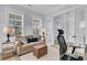 Bright office space showcasing a comfortable seating area and large windows at 1182 Welcome Dr Dr, Mount Pleasant, SC 29464