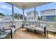Relaxing outdoor porch area with cushioned seating, views of the community at 1182 Welcome Dr Dr, Mount Pleasant, SC 29464