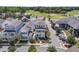 Charming two-story homes line a street with a golf course backdrop in this vibrant community at 1182 Welcome Dr Dr, Mount Pleasant, SC 29464