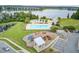 A beautiful aerial view of a pool, playground, parking area, lake, and the surrounding community at 121 Ancestry Ln, Moncks Corner, SC 29461