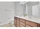 Bathroom featuring double vanity sinks, and large mirror at 121 Ancestry Ln, Moncks Corner, SC 29461