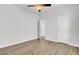 Spacious bedroom featuring wood-look flooring and ceiling fan for comfortable living at 121 Ancestry Ln, Moncks Corner, SC 29461