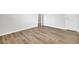 Bright bedroom featuring wood-look flooring and a closet for comfortable living at 121 Ancestry Ln, Moncks Corner, SC 29461