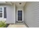 Close up of the home's front door, showing modern hardware and a secure entryway at 121 Ancestry Ln, Moncks Corner, SC 29461
